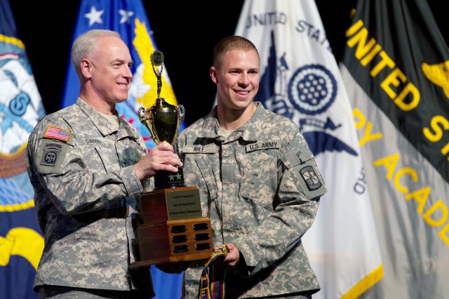Penn State squad leader Jake Ahle on Saturday receives the trophy given to the top ROTC team at Sandhurst from Maj. Gen. Jeff Smith, U.S. Army Cadet Command commanding general. Penn State finished second overall in the international competition held this weekend at West Point, N.Y. Photo by Steve Arel/U.S. Army Cadet Command